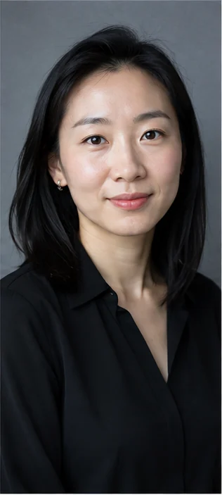 Headshot style sample with a neutral gray background