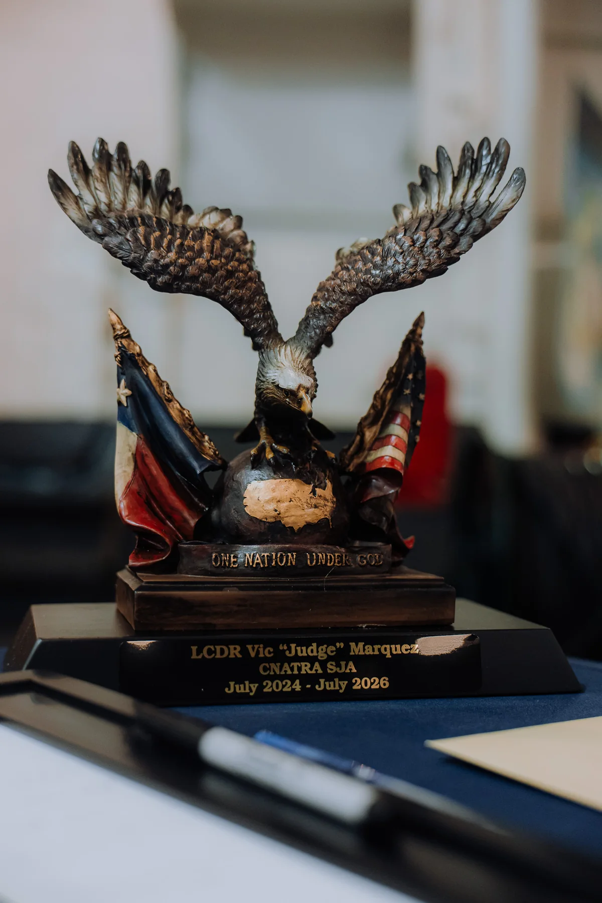Detailed Navy award displayed at a ceremony